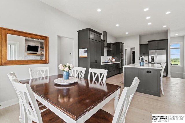 10317 S 191st Ave, Omaha, NE 68136 - dining area featuring light wood finished floors, recessed lighting, and baseboards
