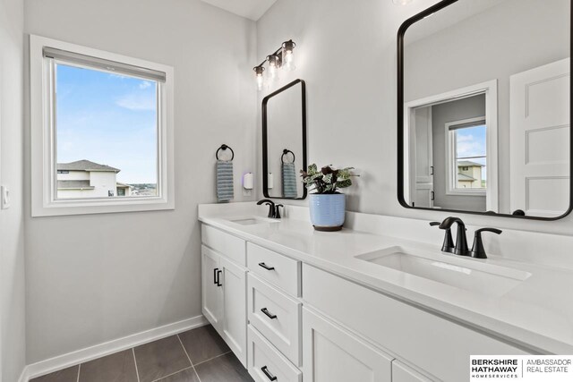 10317 S 191st Ave, Omaha, NE 68136 - full bath featuring double vanity and baseboards