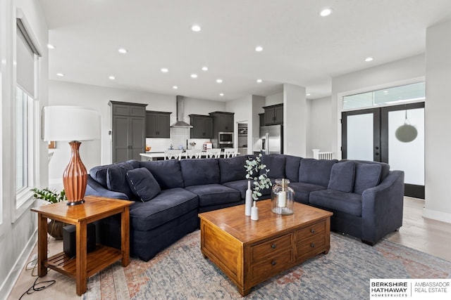 10317 S 191st Ave, Omaha, NE 68136 - living area featuring recessed lighting, baseboards, and light wood-style flooring