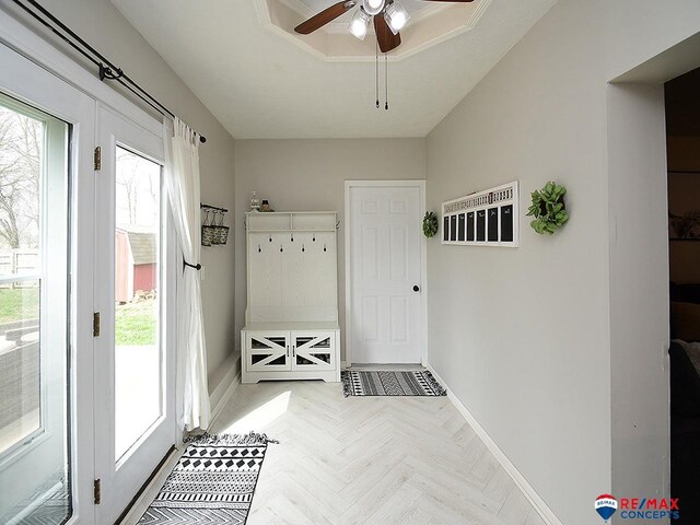 649 W 2nd St, Wahoo, NE 68066 - mudroom featuring baseboards, healthy amount of natural light, and ceiling fan