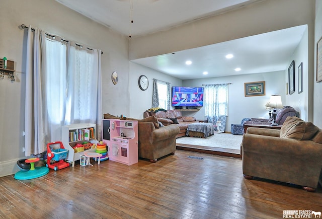 429 N 4th St, Tecumseh, NE 68450 - living room featuring wood-type flooring and recessed lighting