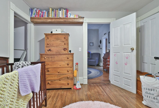 429 N 4th St, Tecumseh, NE 68450 - bedroom featuring wood finished floors