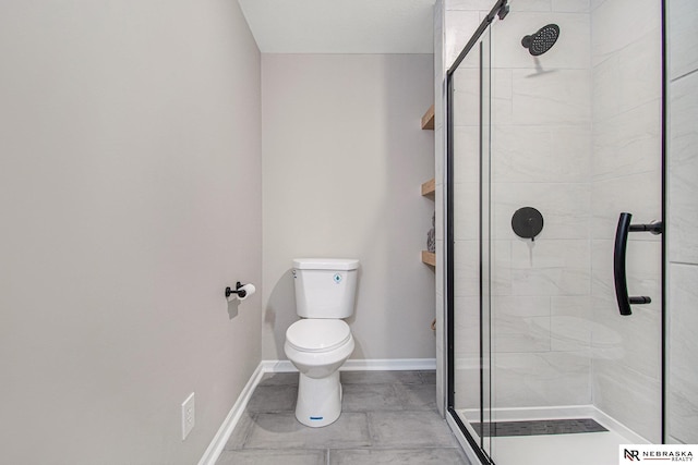 606 Pioneer Dr, Fort Calhoun, NE 68023 - full bathroom with toilet, a shower stall, and baseboards