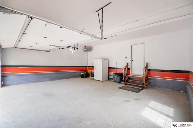 606 Pioneer Dr, Fort Calhoun, NE 68023 - garage featuring a garage door opener