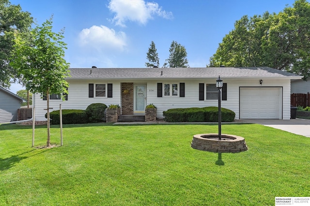 6641 S 85th St, Ralston, NE 68127 - ranch-style house with a garage and driveway