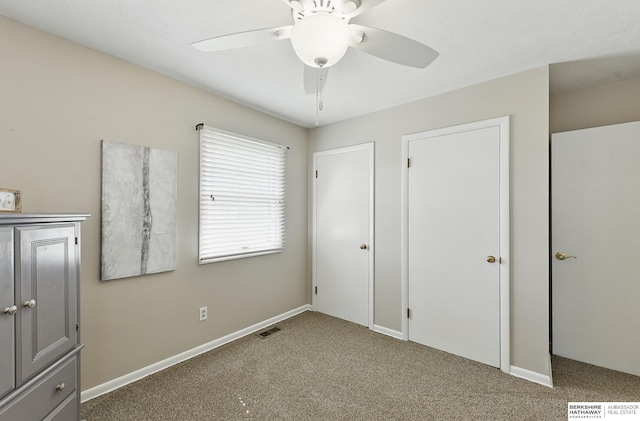 6641 S 85th St, Ralston, NE 68127 - unfurnished bedroom featuring carpet flooring, baseboards, and ceiling fan