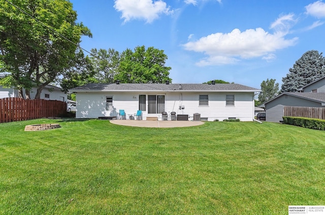 6641 S 85th St, Ralston, NE 68127 - rear view of property featuring a patio area, a fire pit, and central AC unit