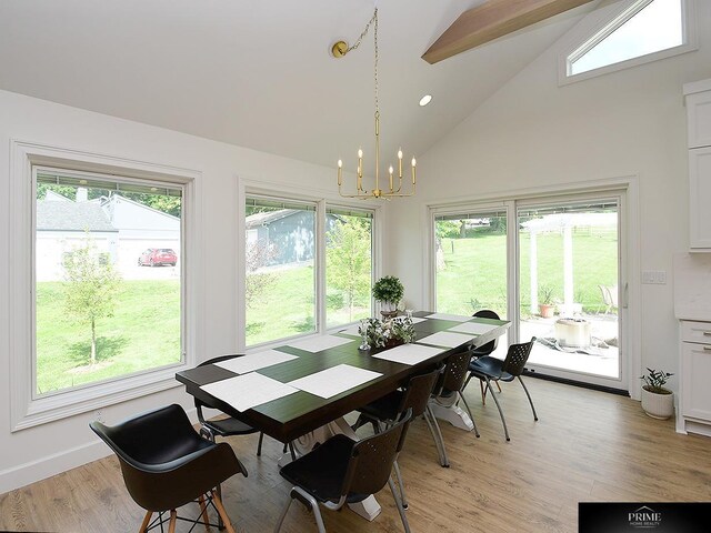 20640 Rawhide Rd, Omaha, NE 68022 - dining area with a chandelier, high vaulted ceiling, light wood-style flooring, baseboards, and recessed lighting