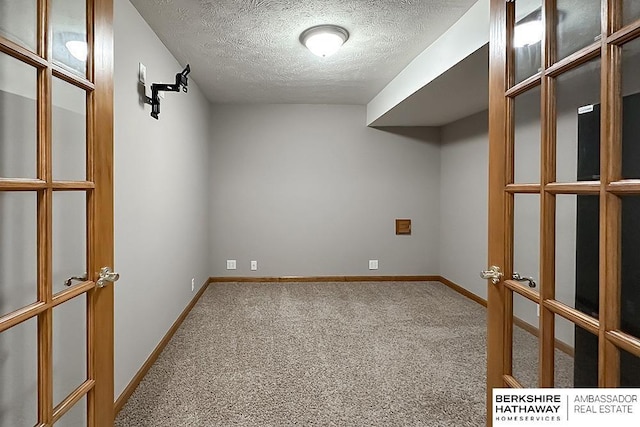 5360 S 174th Ave, Omaha, NE 68135 - carpeted spare room with a textured ceiling and baseboards