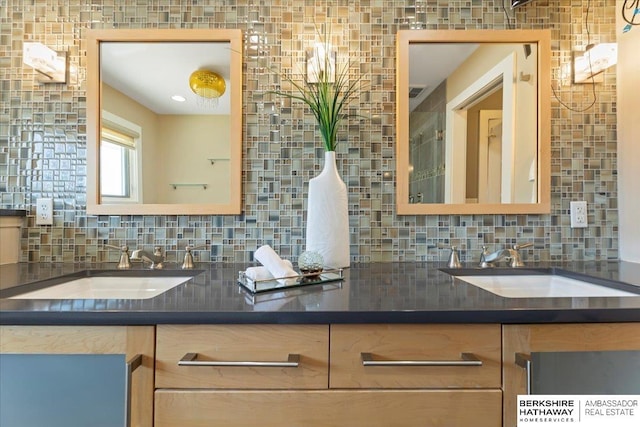 1312 S 78th St, Omaha, NE 68124 - kitchen with backsplash, a sink, and dark countertops