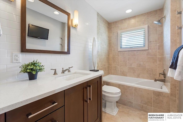 1312 S 78th St, Omaha, NE 68124 - full bath with vanity, toilet, tile patterned flooring, tiled shower / bath combo, and decorative backsplash