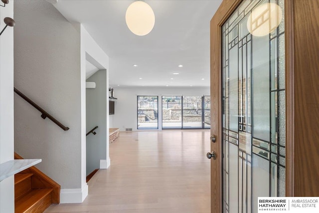1312 S 78th St, Omaha, NE 68124 - foyer with wood finished floors, baseboards, and recessed lighting