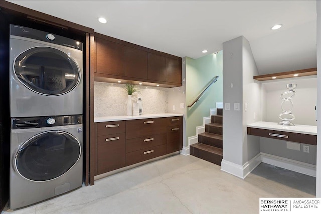 1312 S 78th St, Omaha, NE 68124 - laundry area featuring estacked washer and dryer, recessed lighting, and baseboards