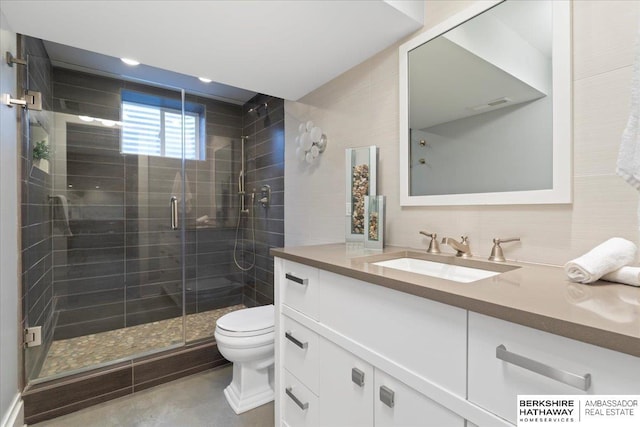 1312 S 78th St, Omaha, NE 68124 - bathroom with vanity, toilet, and a stall shower