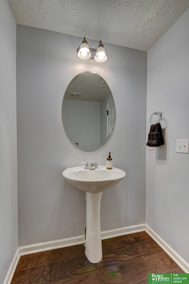 10505 Rosewater Pkwy, Bennington, NE 68007 - bathroom with wood finished floors and baseboards
