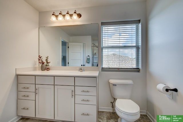 10505 Rosewater Pkwy, Bennington, NE 68007 - full bathroom with vanity, baseboards, toilet, and a shower