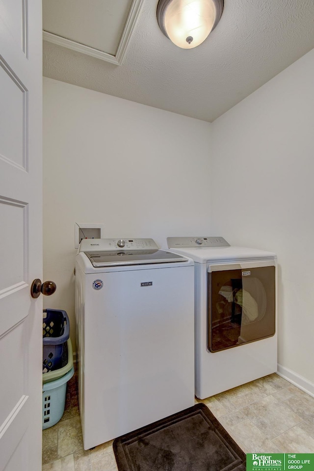 10505 Rosewater Pkwy, Bennington, NE 68007 - washroom featuring washing machine and clothes dryer