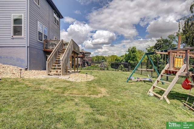 10505 Rosewater Pkwy, Bennington, NE 68007 - view of yard with a playground, stairway, and a wooden deck