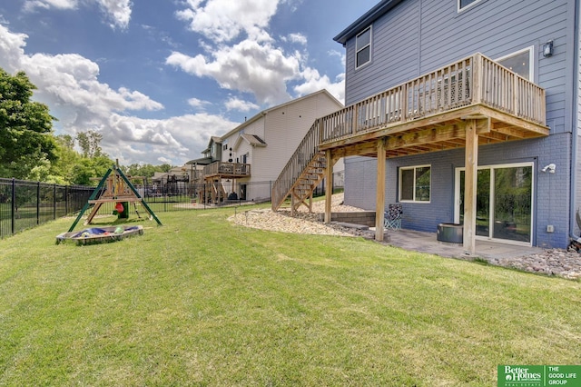10505 Rosewater Pkwy, Bennington, NE 68007 - view of yard with a wooden deck, a playground, a patio, and stairs