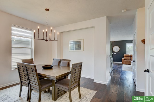 10505 Rosewater Pkwy, Bennington, NE 68007 - dining area featuring a chandelier, dark wood finished floors, and baseboards