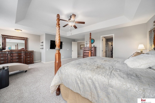21327 Quarry Ln, Gretna, NE 68028 - bedroom featuring carpet, a tray ceiling, baseboards, and ceiling fan