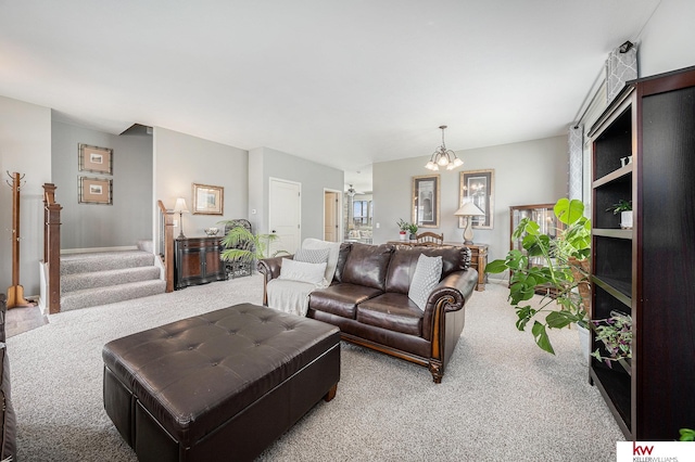 21327 Quarry Ln, Gretna, NE 68028 - living area featuring carpet flooring, a chandelier, stairway, and baseboards