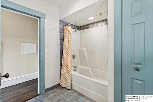 646 W 8th St, Fremont, NE 68025 - full bathroom with shower / tub combo, tile patterned flooring, and baseboards