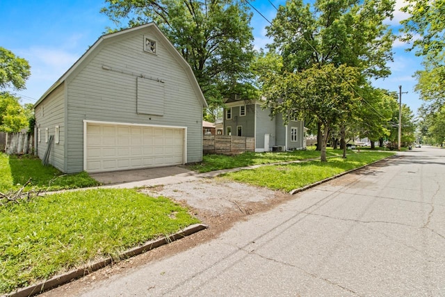 646 W 8th St, Fremont, NE 68025 - view of side of property featuring a garage and an outdoor structure