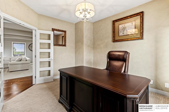 1220 S 200th Ave, Omaha, NE 68130 - office space with a chandelier, baseboards, and light colored carpet