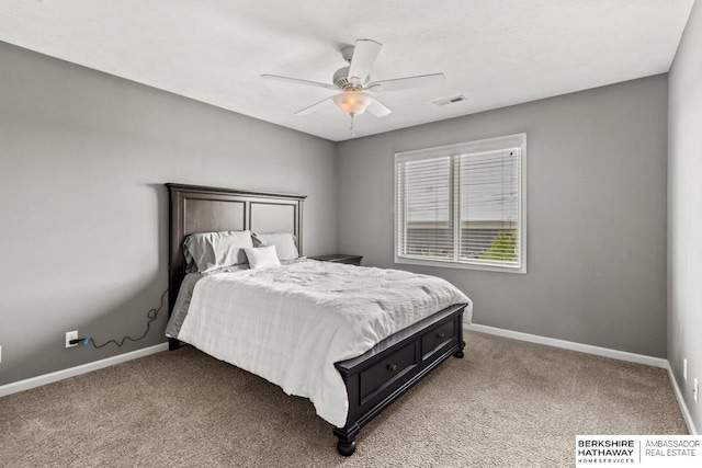 1220 S 200th Ave, Omaha, NE 68130 - bedroom featuring light carpet, baseboards, and ceiling fan