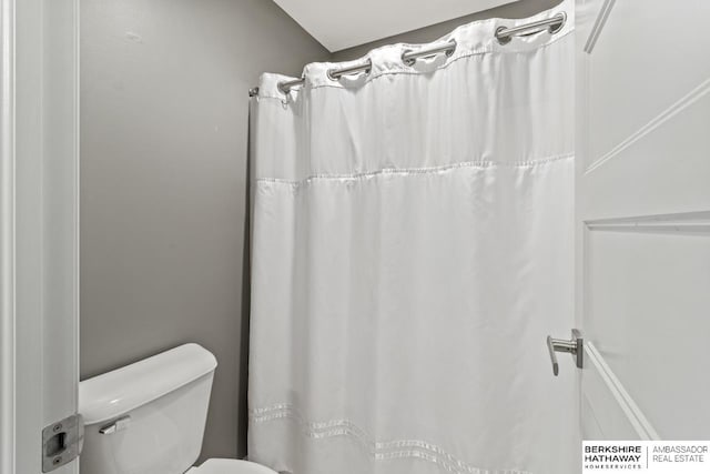 1220 S 200th Ave, Omaha, NE 68130 - full bathroom featuring toilet and curtained shower