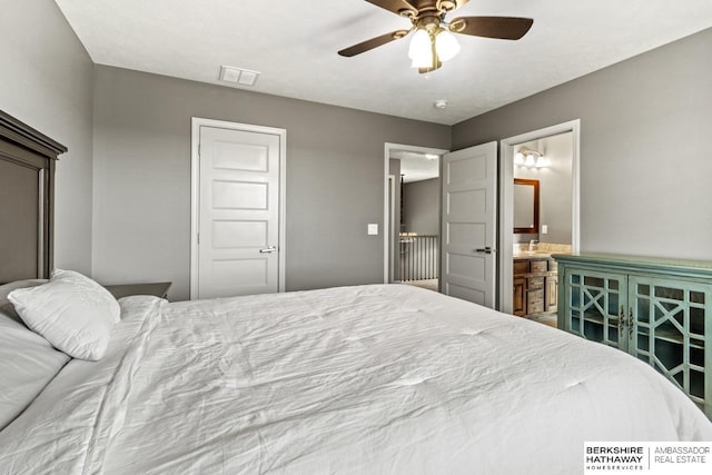 1220 S 200th Ave, Omaha, NE 68130 - bedroom featuring ensuite bath and a ceiling fan