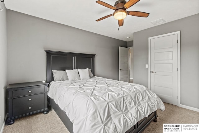 1220 S 200th Ave, Omaha, NE 68130 - carpeted bedroom featuring baseboards and a ceiling fan