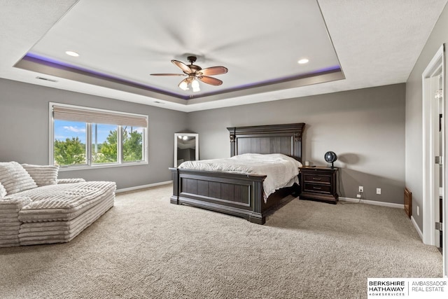 1220 S 200th Ave, Omaha, NE 68130 - carpeted bedroom with a tray ceiling, baseboards, recessed lighting, and ceiling fan