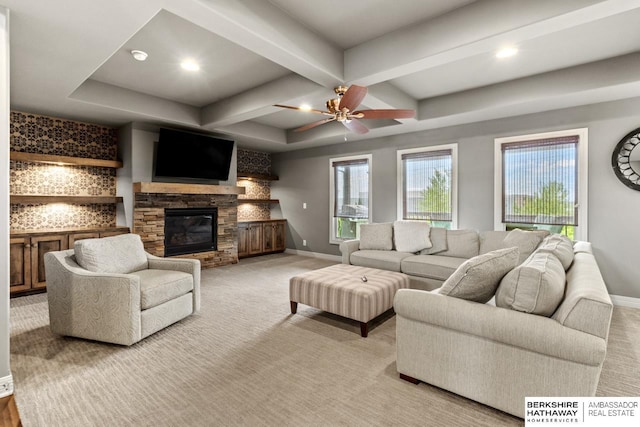 1220 S 200th Ave, Omaha, NE 68130 - living room with baseboards, a stone fireplace, light colored carpet, beam ceiling, and a ceiling fan