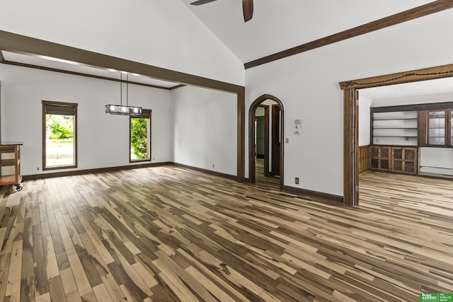8259 Paradise Hills Ln, Fort Calhoun, NE 68023 - unfurnished living room featuring arched walkways, a ceiling fan, wood finished floors, high vaulted ceiling, and baseboards