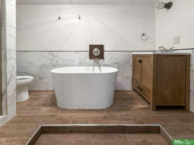 8259 Paradise Hills Ln, Fort Calhoun, NE 68023 - bathroom with a soaking tub, vanity, tile walls, and a wainscoted wall