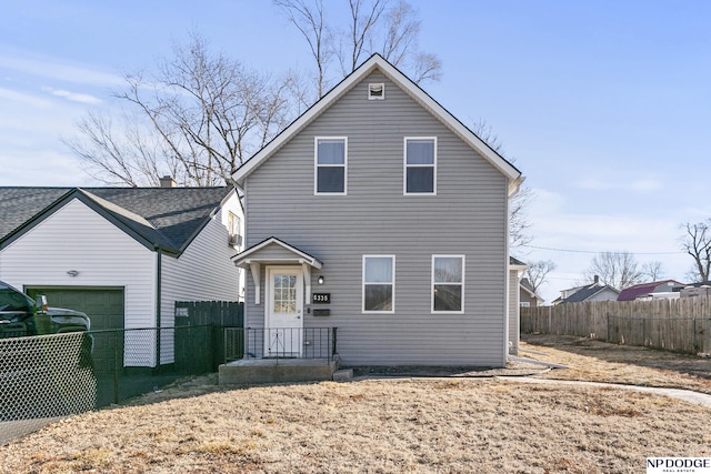 5335 N 26th St, Omaha, NE 68111 - traditional-style home with an attached garage
