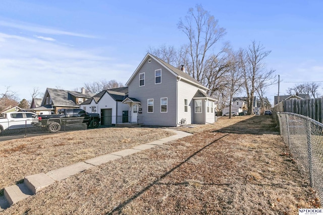 5335 N 26th St, Omaha, NE 68111 - view of side of home with a chimney and a residential view