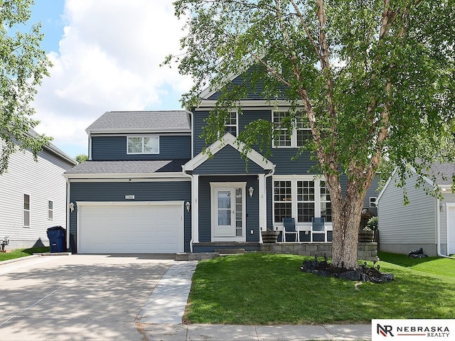 7941 N 152nd St, Bennington, NE 68007 - view of front facade with concrete driveway, a front yard, a shingled roof, and covered porch