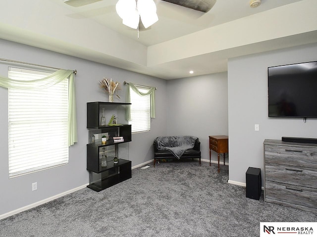 7941 N 152nd St, Bennington, NE 68007 - living area with carpet, a ceiling fan, and baseboards