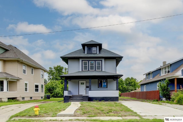 2306 Ogden St, Omaha, NE 68110 - traditional style home with covered porch and roof with shingles