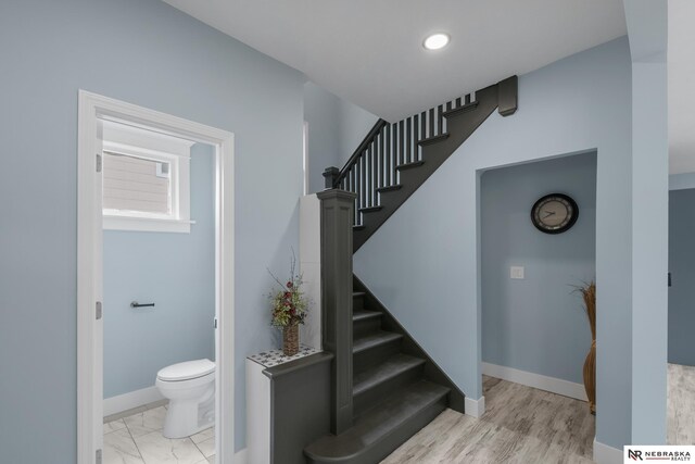 2306 Ogden St, Omaha, NE 68110 - stairs featuring baseboards and recessed lighting