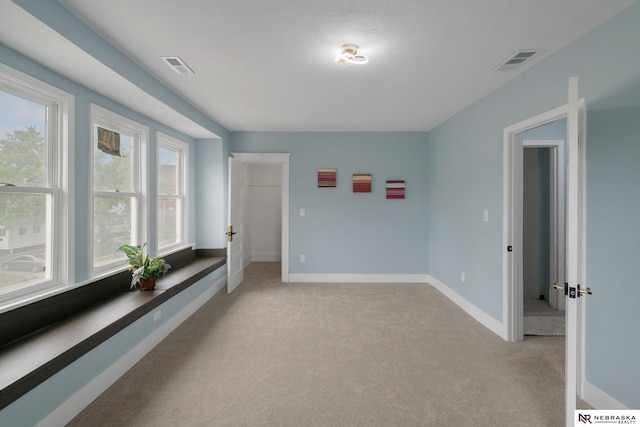 2306 Ogden St, Omaha, NE 68110 - spare room with light carpet and baseboards