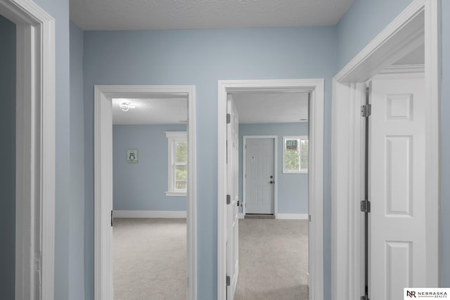 2306 Ogden St, Omaha, NE 68110 - corridor with carpet flooring and baseboards