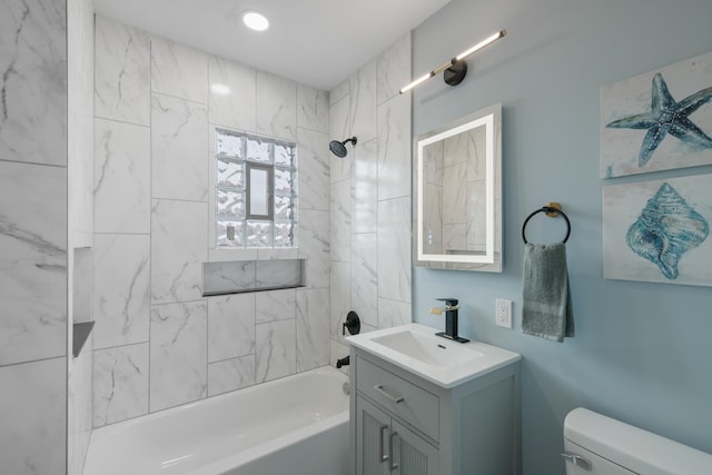 2306 Ogden St, Omaha, NE 68110 - bathroom with vanity, washtub / shower combination, and toilet