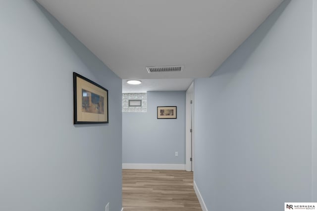 2306 Ogden St, Omaha, NE 68110 - corridor featuring light wood-type flooring and baseboards