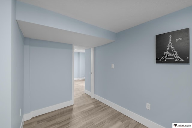 2306 Ogden St, Omaha, NE 68110 - unfurnished room with wood finished floors and baseboards