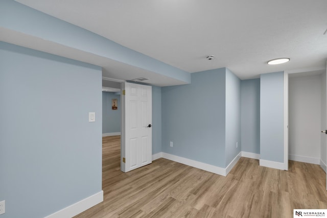 2306 Ogden St, Omaha, NE 68110 - finished below grade area with baseboards and light wood finished floors