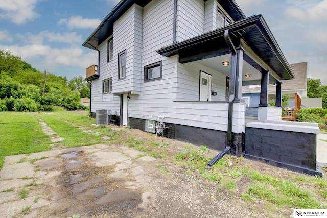 2306 Ogden St, Omaha, NE 68110 - view of property exterior featuring central air condition unit